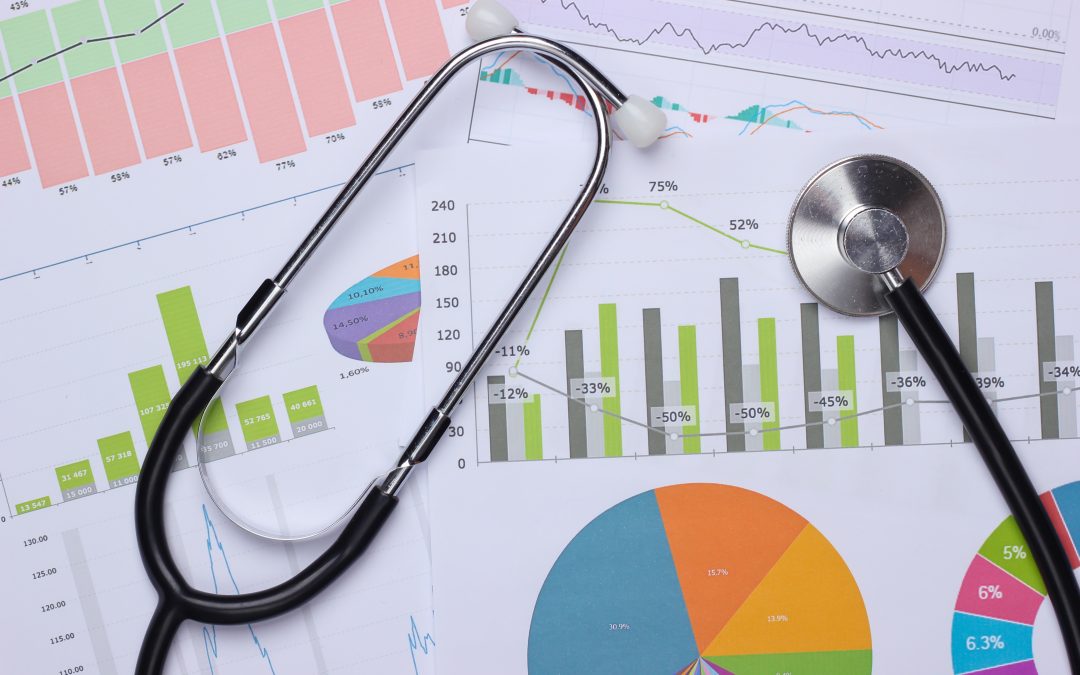 Medical statistics and analytics. Stethoscope with graphs and charts.